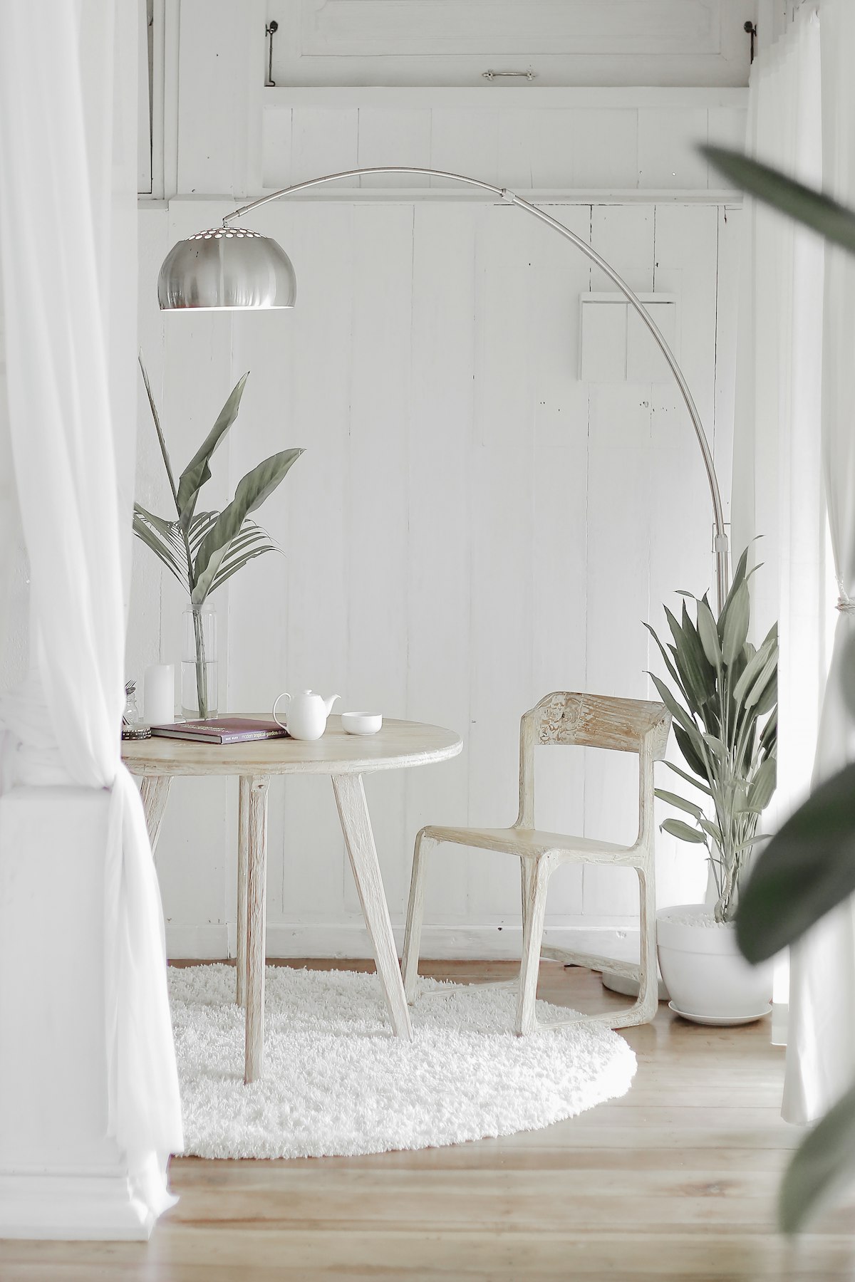 Serene decluttered modern living room featuring closed media joinery and clean aesthetic lines